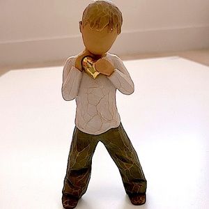 WILLOW TREE HEART OF GOLD. BOY HOLDING A GOLD HEART